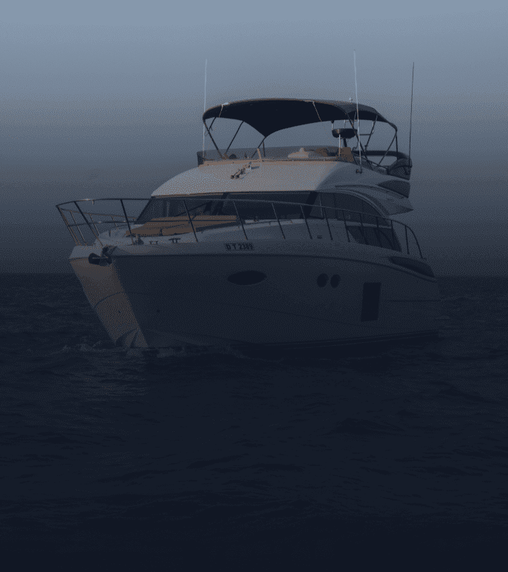 Skyline view of Dubai, night stand over the night in a ultimate luxury sea journey cheap yacht rental.